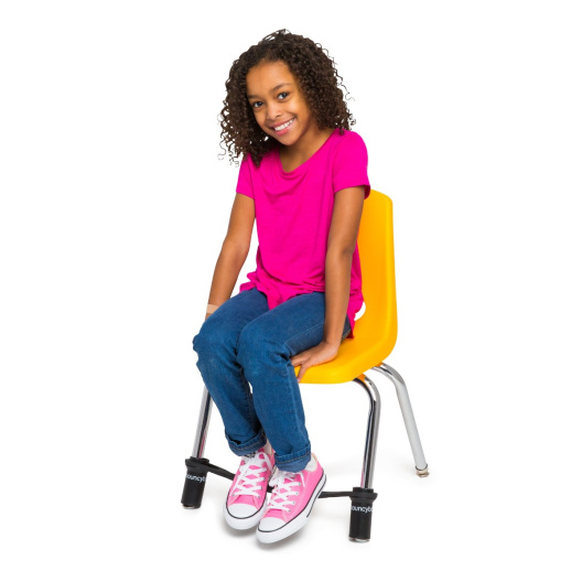 A relevant stock photo of school chairs in a typical setting.