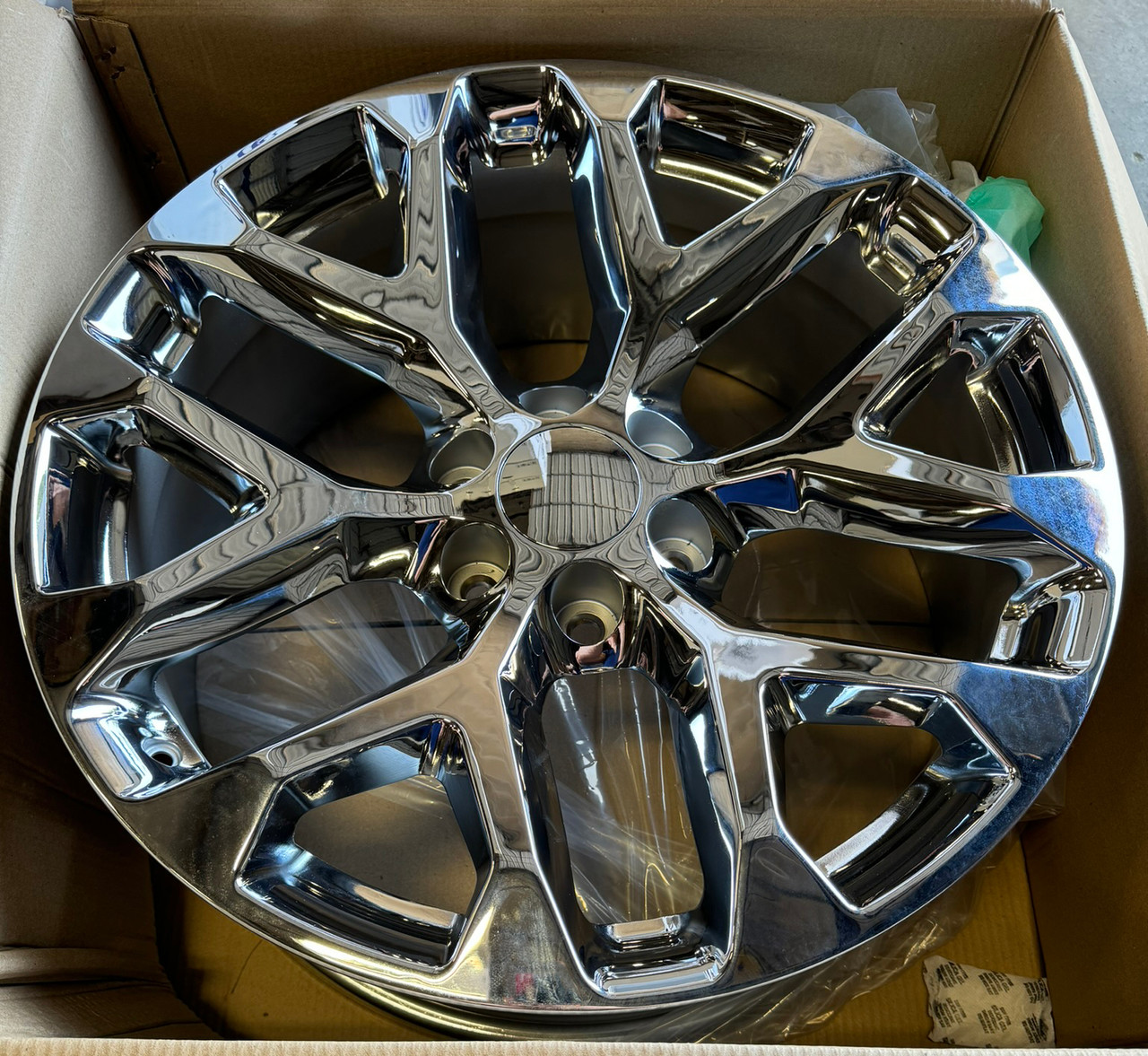 A relevant stock photo of snowflake rims in a typical setting.