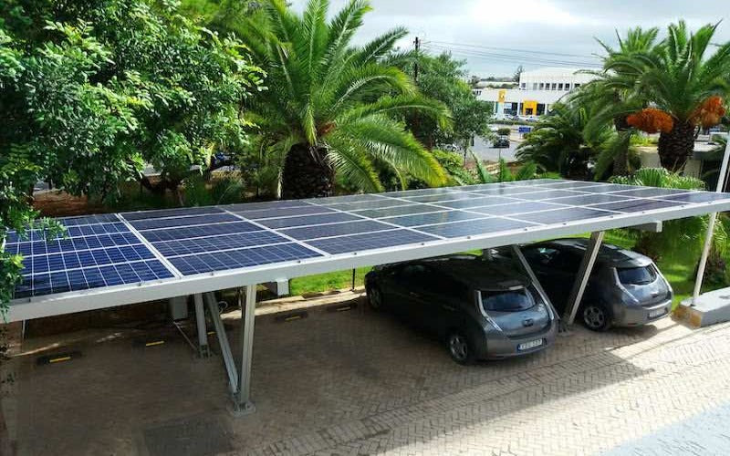 A relevant stock photo of solar carport in a typical setting.