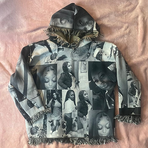 A relevant stock photo of tapestry hoodie in a typical setting.