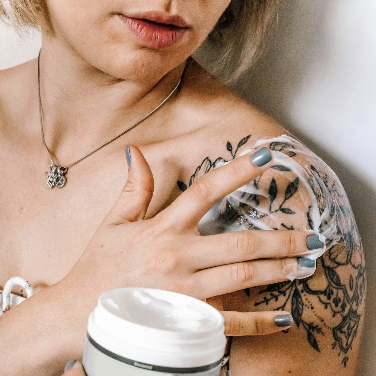 A relevant stock photo of tattoo lotion in a typical setting.