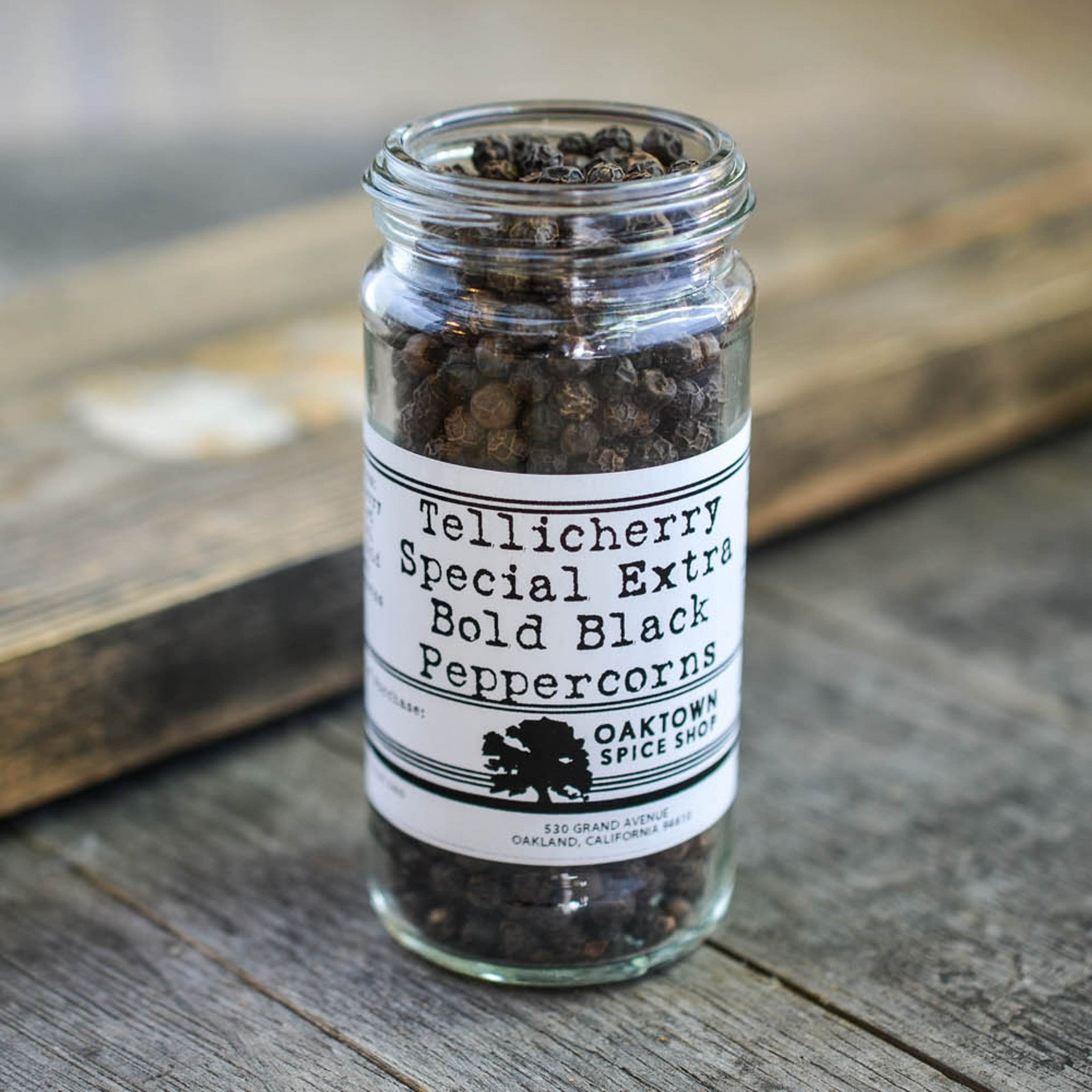 A relevant stock photo of tellicherry peppercorns in a typical setting.
