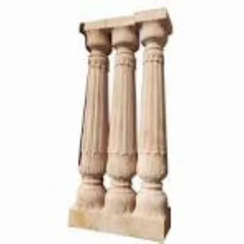 A relevant stock photo of three large sandstone pillars in a typical setting.