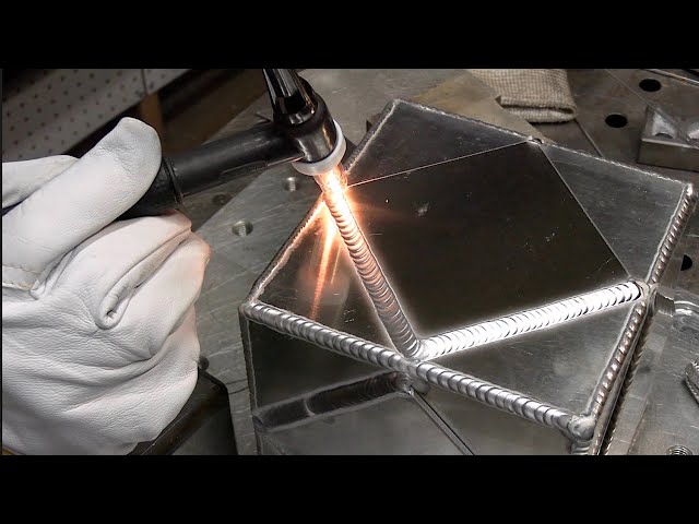 A relevant stock photo of tig welders for aluminium in a typical setting.