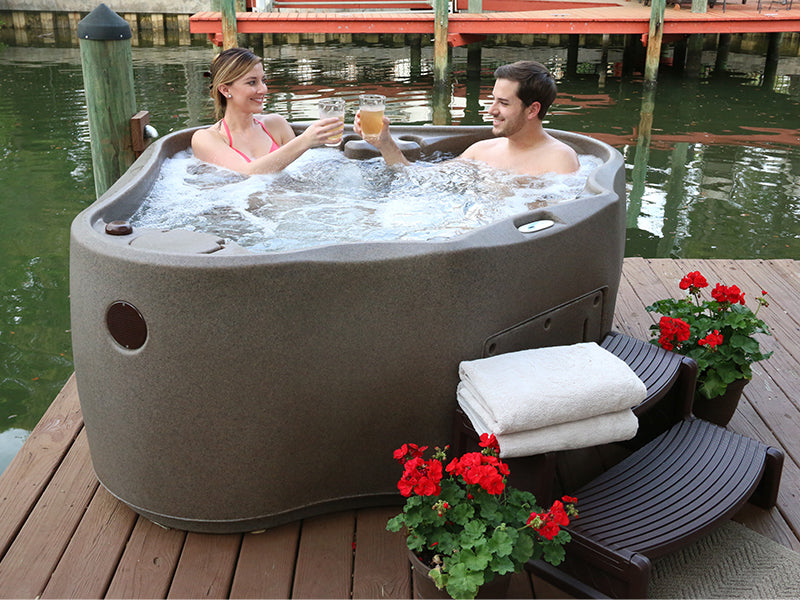 A relevant stock photo of two man jacuzzi in a typical setting.