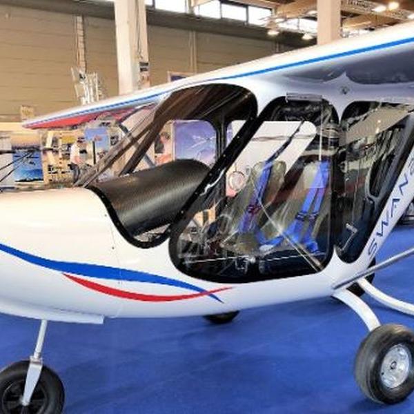 A relevant stock photo of ultralight aircraft for sale in a typical setting.