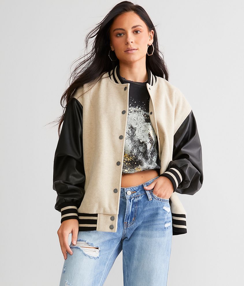 A relevant stock photo of varsity jacket women in a typical setting.