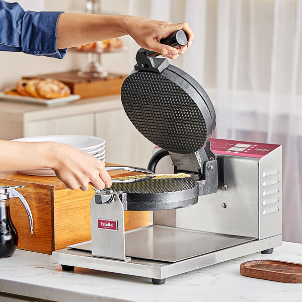 A relevant stock photo of waffle and waffle cone maker in a typical setting.