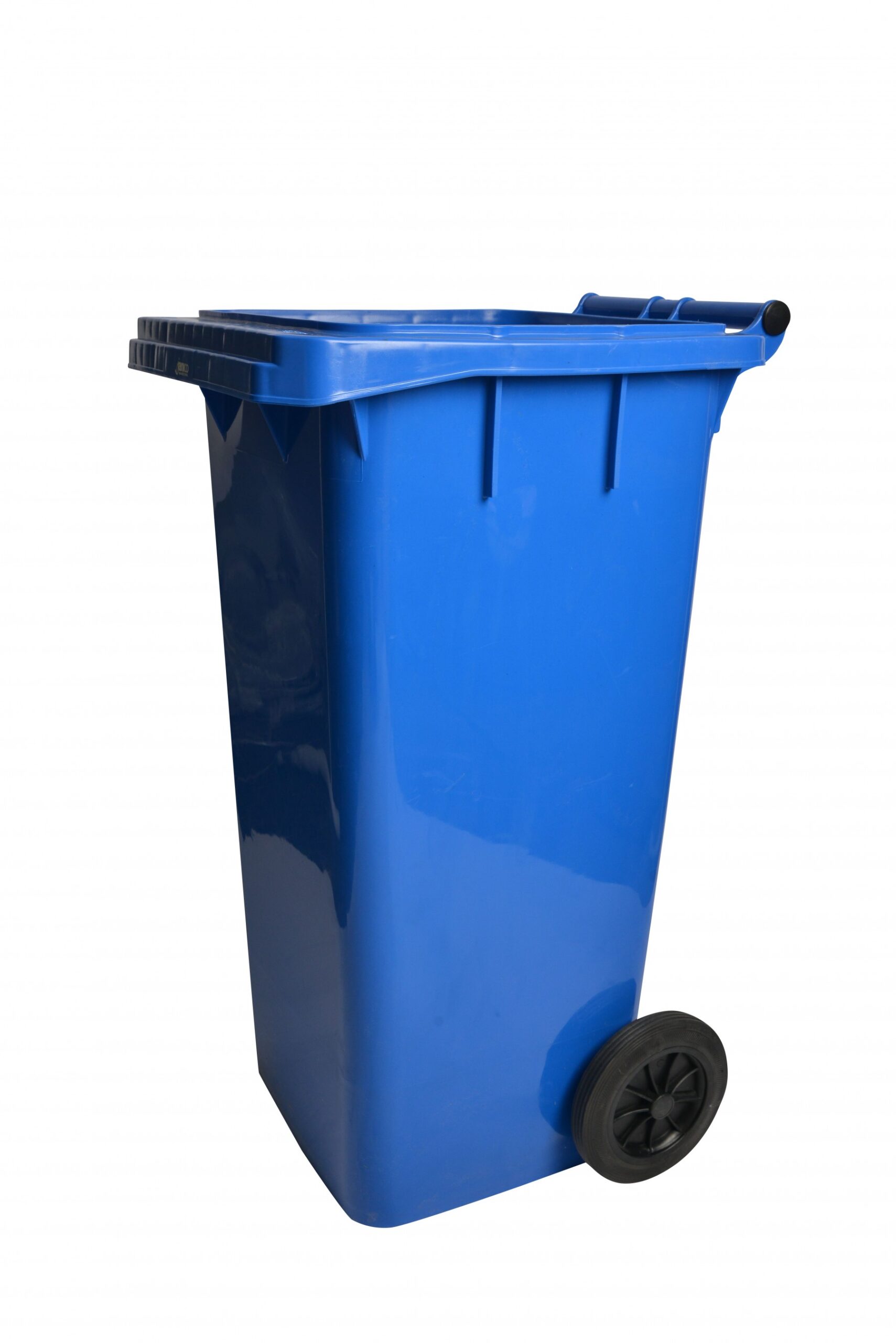 A relevant stock photo of waste container on wheels in a typical setting.