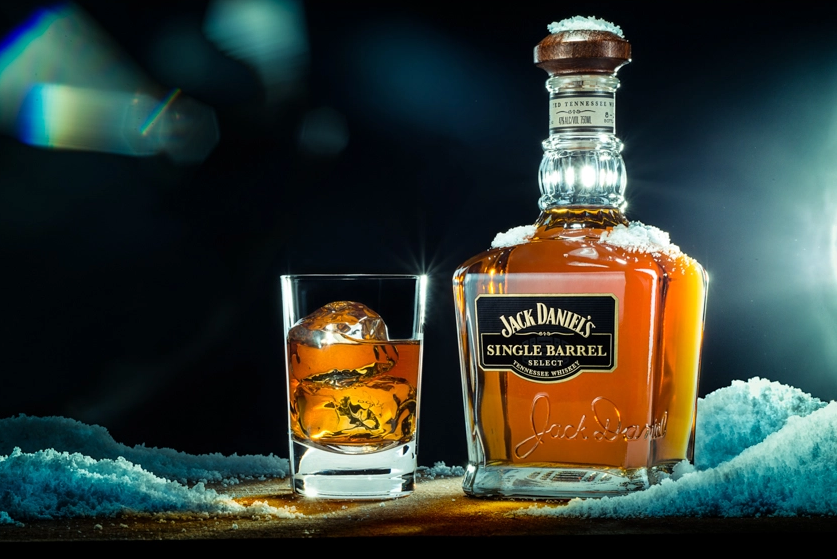 A relevant stock photo of whiskey bottle in a typical setting.