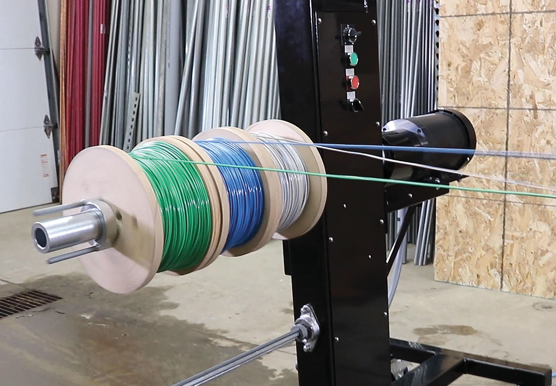 A relevant stock photo of wire spool in a typical setting.