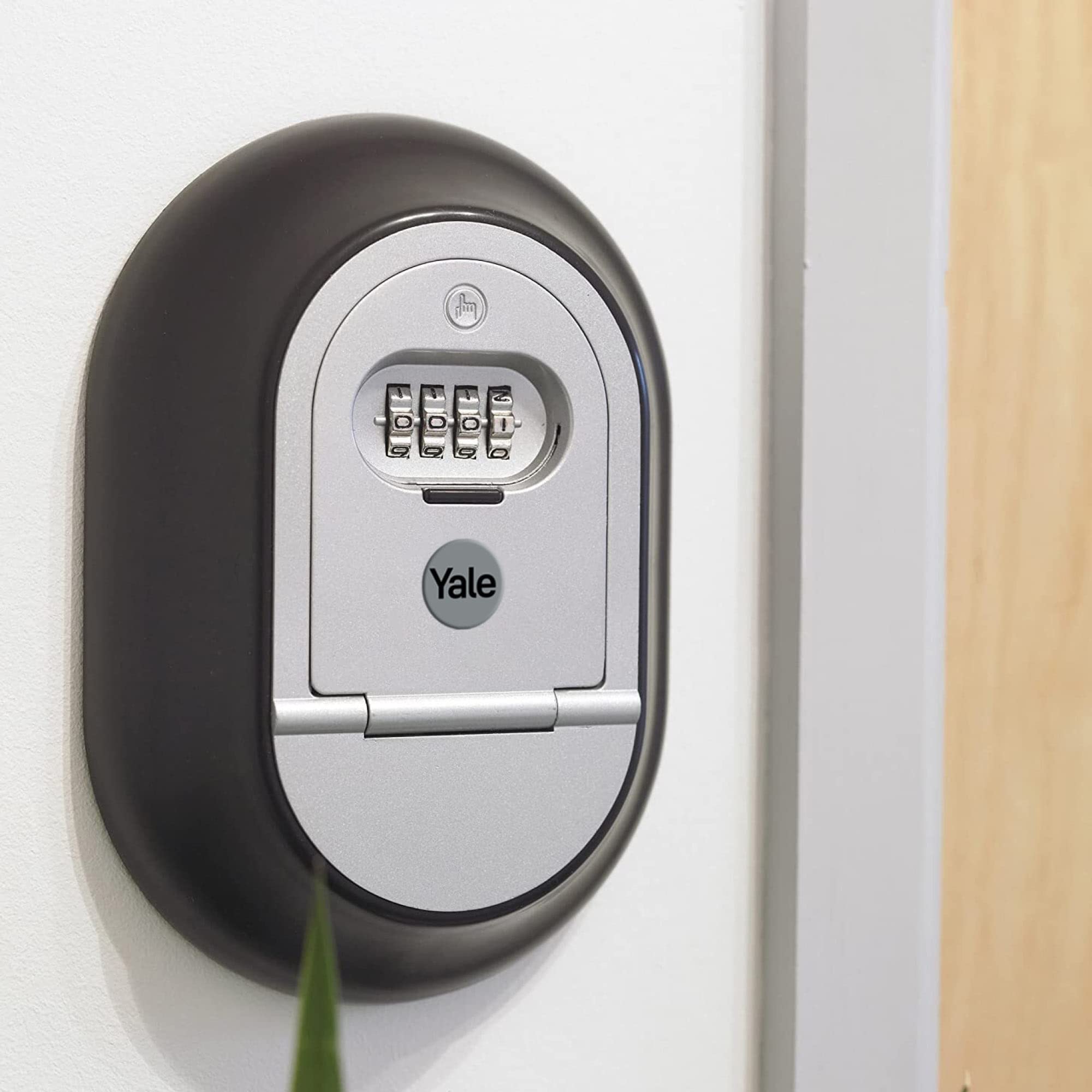 A relevant stock photo of yale combination wall keys locks in a typical setting.