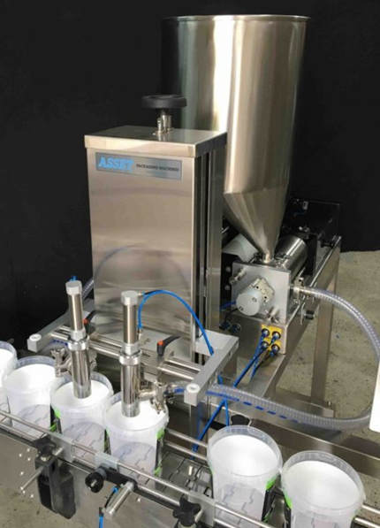 Illustrative example of fruit juice filling machine from Google Search