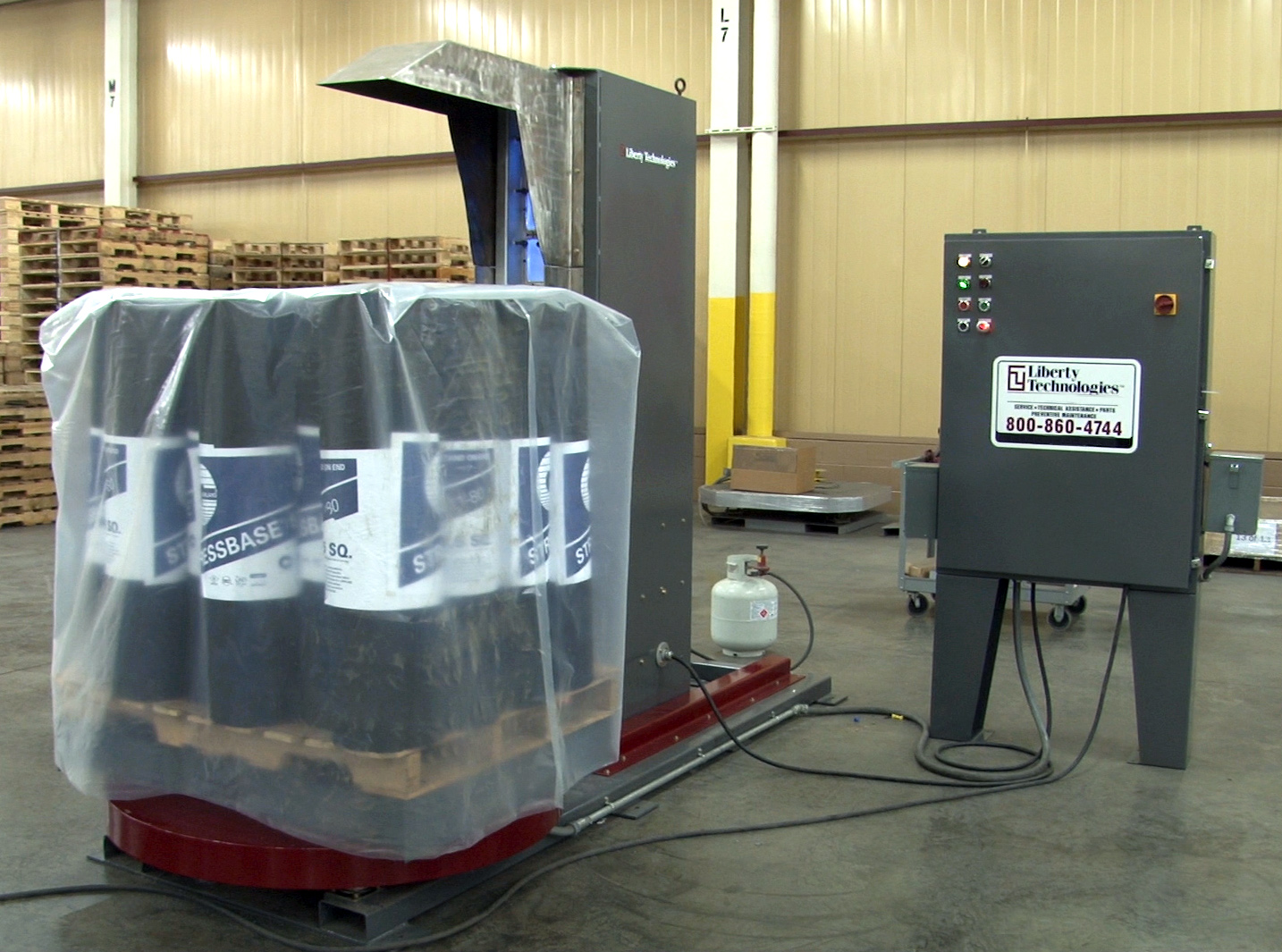 Illustrative example of pallet shrink wrap machine from Google Search